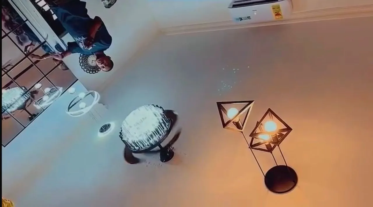 Pendant lights and ceiling fan installed in a room