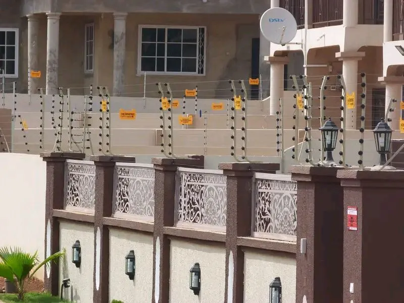 Electric fence installed around a residential compound wall