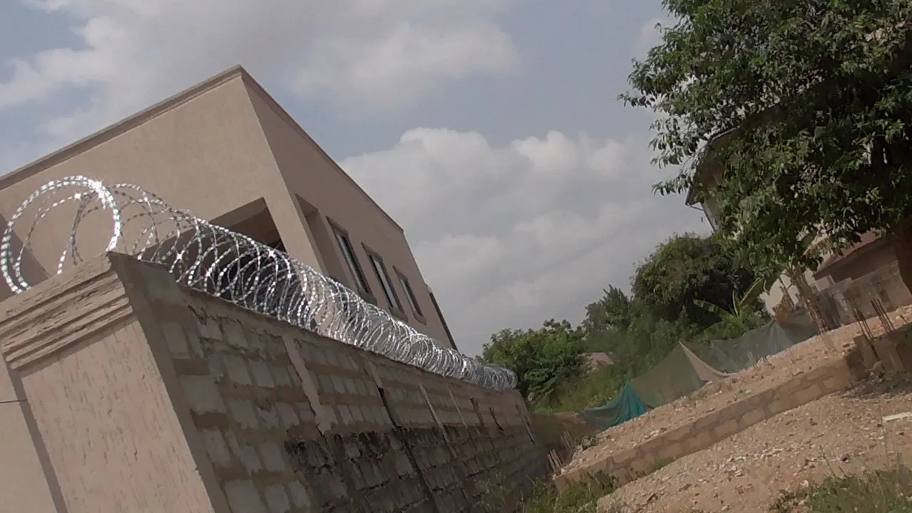 Razor wire fitted along a residential perimeter wall